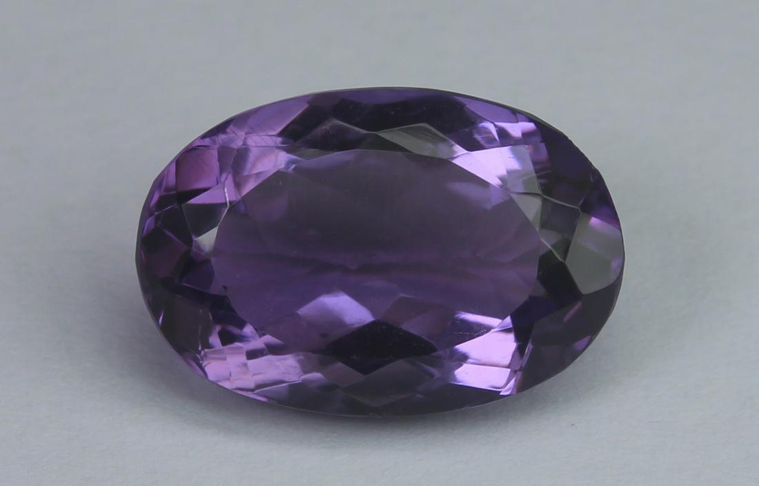 6.68 Cts Natural Amethyst: No Reserve! Title: 6.68 Cts Natural Amethyst Additional Information: Gemstone : Natural Lemon Quartz Shape : Pear CabochonMeasurements : 15.5x11.5x5.4Weight : 5.84 CaratsColor : YellowTransparency : T
