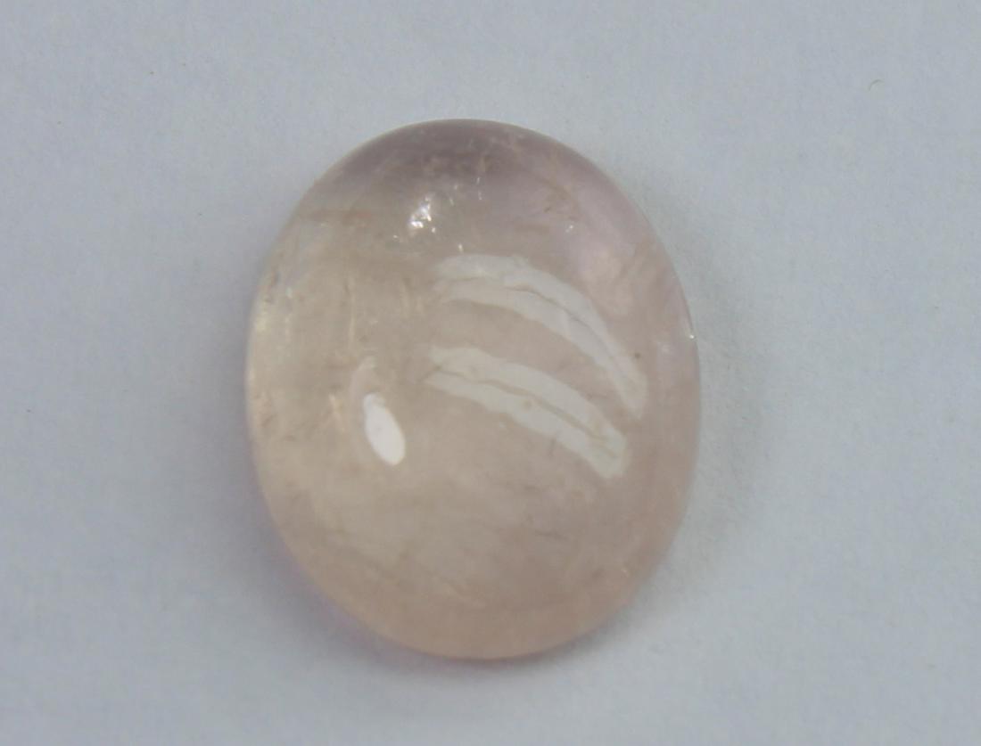 2.57 Cts Natural Morganite: No Reserve! Title: 2.57 Cts Natural Morganite Additional Information: Gemstone: Natural MorganiteOrigin: Africa Weight: 2.57 Carats Measurements: 10x8 mm Calibrated Shape : Oval Cabochon Colour: Pink 