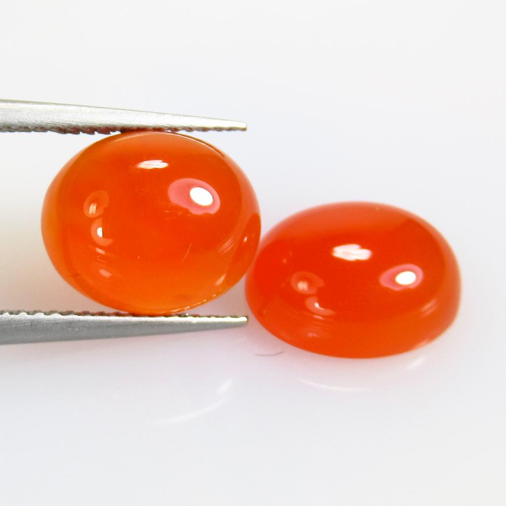 9.31 Ct Natural Orange Carnelian Oval Pair: No Reserve! Title: 9.31 Ct Natural Orange Carnelian Oval Pair Stone Clarity: Semi-Transparent Gemstone: Natural Carnelian Carat Weight: 9.31 Size/Dimensions: 12.10 x 10.00 x 5.20 mm / 2 PC's Additiona