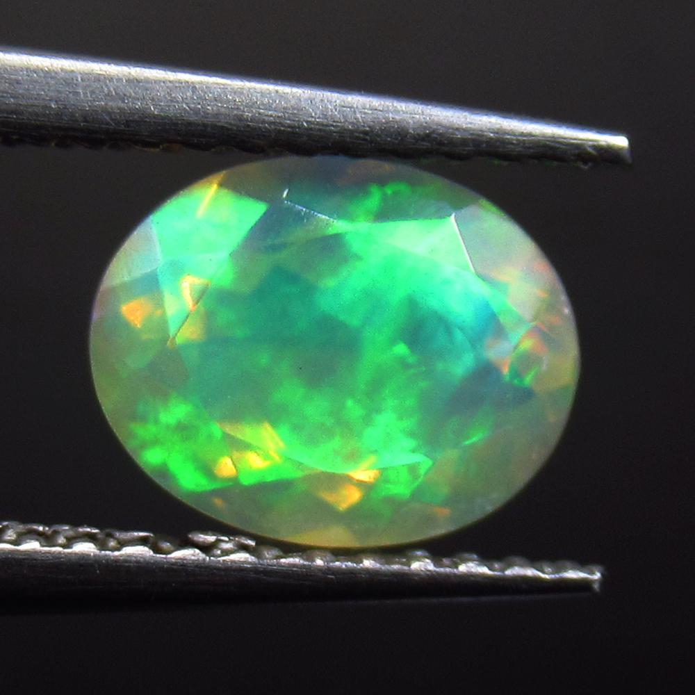 1.10 Ct Natural Multi-Color Faceted Fire Opal Oval Cut (1 of 2)