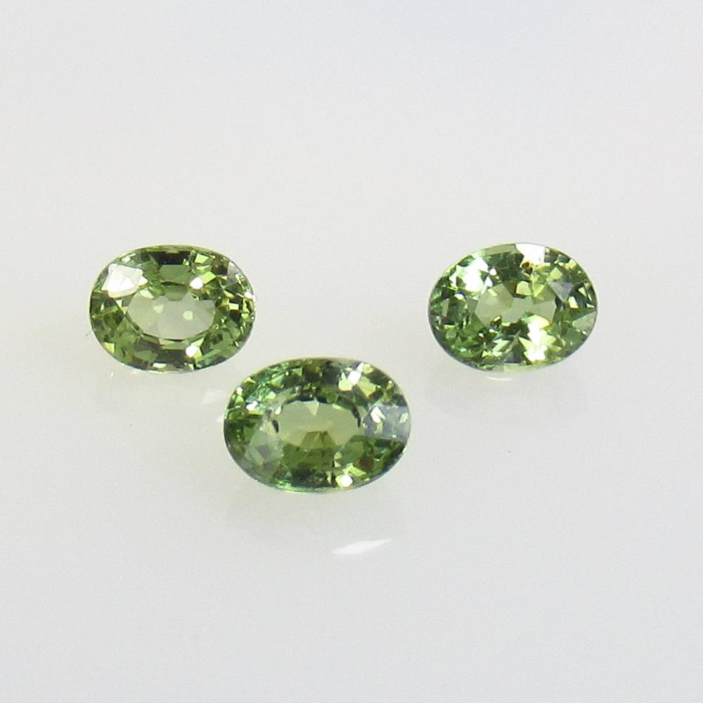 0.86 Ct Natural 3 Green Sapphire Oval Set (1 of 2)
