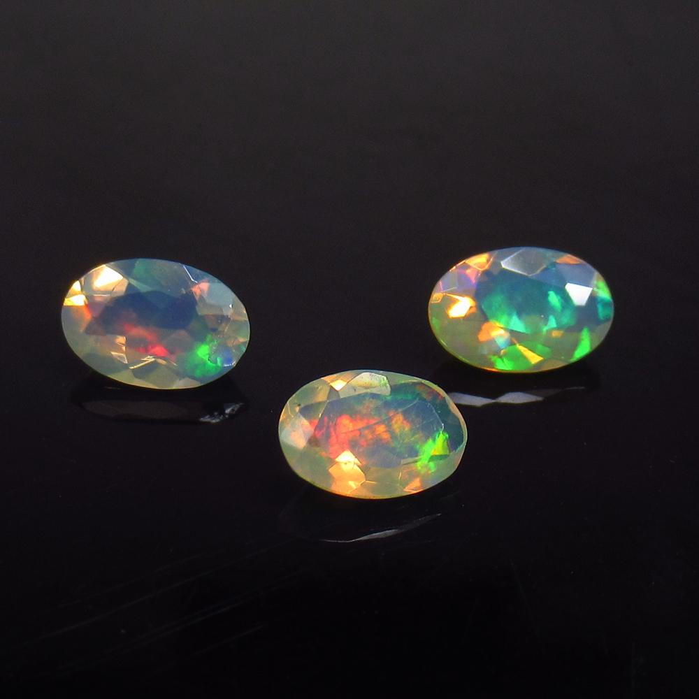 0.81 Ct Natural 3 Multi-Color Faceted Fire Opal Oval (1 of 2)