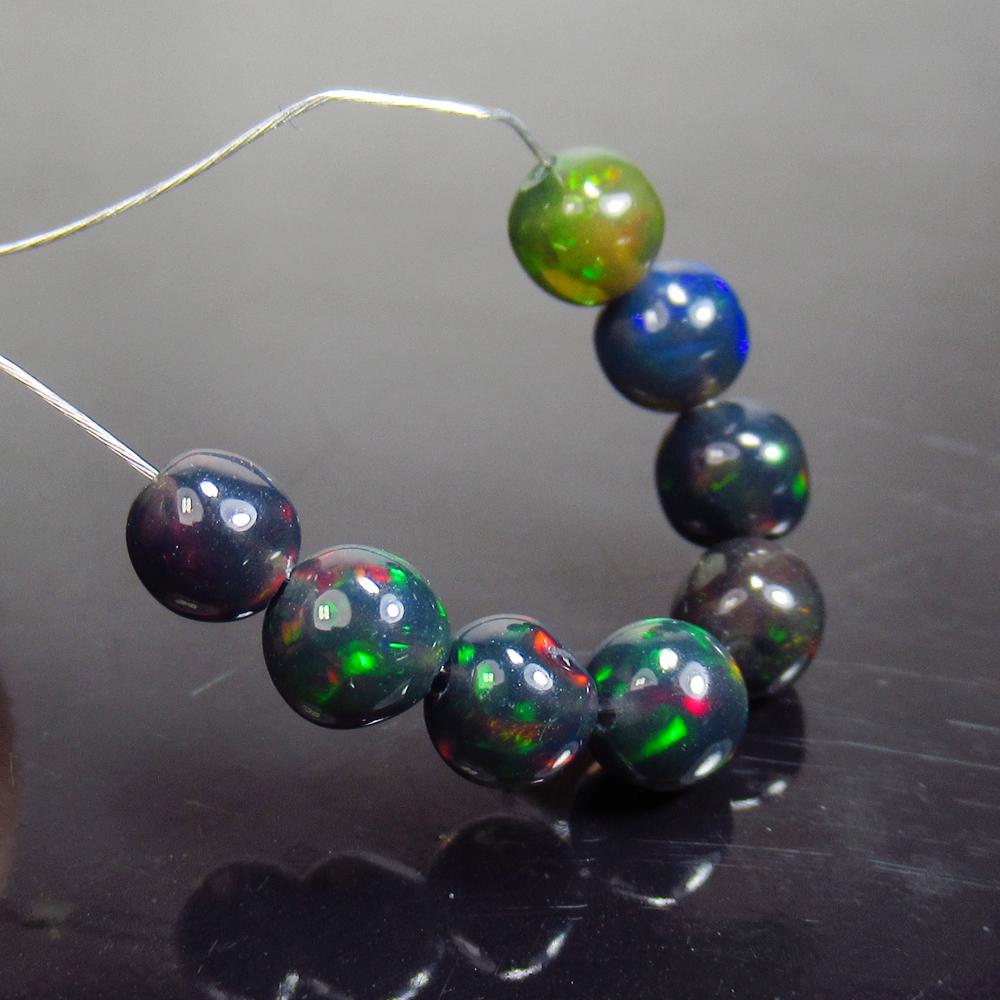 2.47 Ct Natural 8 Drilled Black Fire Opal Ball Beads (1 of 2)
