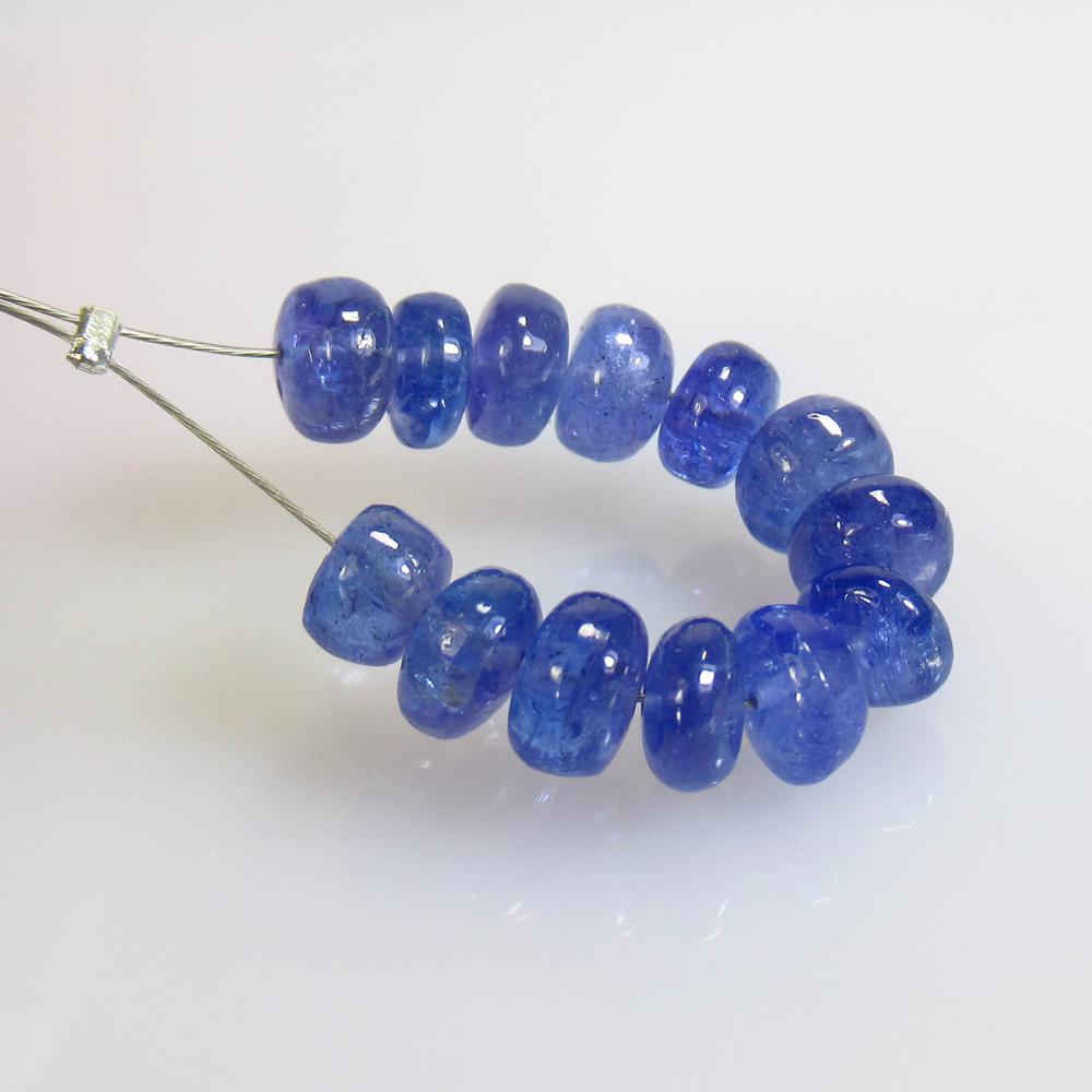 13.56 Ct Natural 13 Drilled Tanzanite Round Beads: No Reserve! Title: 13.56 Ct Natural 13 Drilled Tanzanite Round Beads Stone Clarity: Transparent Gemstone: Natural Tanzanite Beads Carat Weight: 13.56 Size/Dimensions: 5.00 to 5.90 mm / 13 PC's Additio