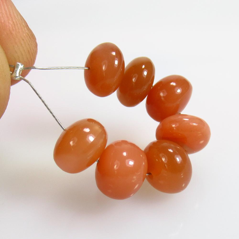 19.64 Ct Natural 7 Drilled Moonstone Round Beads: No Reserve! Title: 19.64 Ct Natural 7 Drilled Moonstone Round Beads Stone Clarity: Opaque Gemstone: Natural Moonstone Beads Carat Weight: 19.64 Size/Dimensions: 8.20 to 8.30 mm / 7 PC's Additional Inf