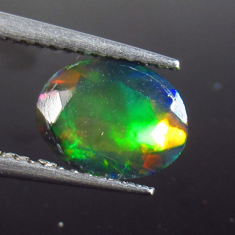 1.13 Ct Natural Ethiopian Black Fire Opal Oval Cut: No Reserve! Title: 1.13 Ct Natural Ethiopian Black Fire Opal Oval Cut Stone Clarity: Translucent Gemstone: Natural Black Opal Carat Weight: 1.13 Size/Dimensions: 9.30 x 7.30 x 4.20 mm Additional Infor