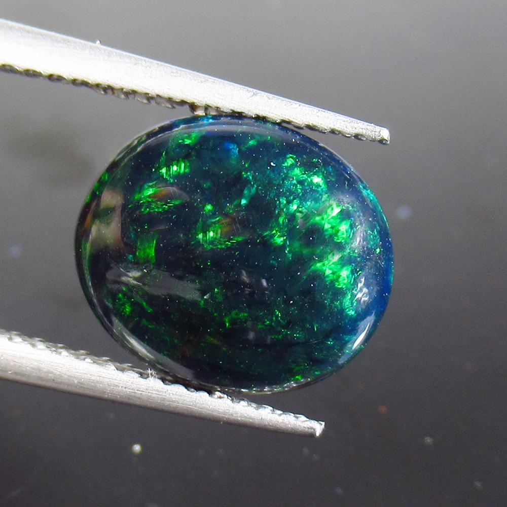 2.29 Ct Natural Ethiopian Black Fire Opal Oval Cut: No Reserve! Title: 2.29 Ct Natural Ethiopian Black Fire Opal Oval Cut Stone Clarity: Translucent Gemstone: Natural Black Opal Carat Weight: 2.29 Size/Dimensions: 11.10 x 9.50 x 4.50 mm Additional Info