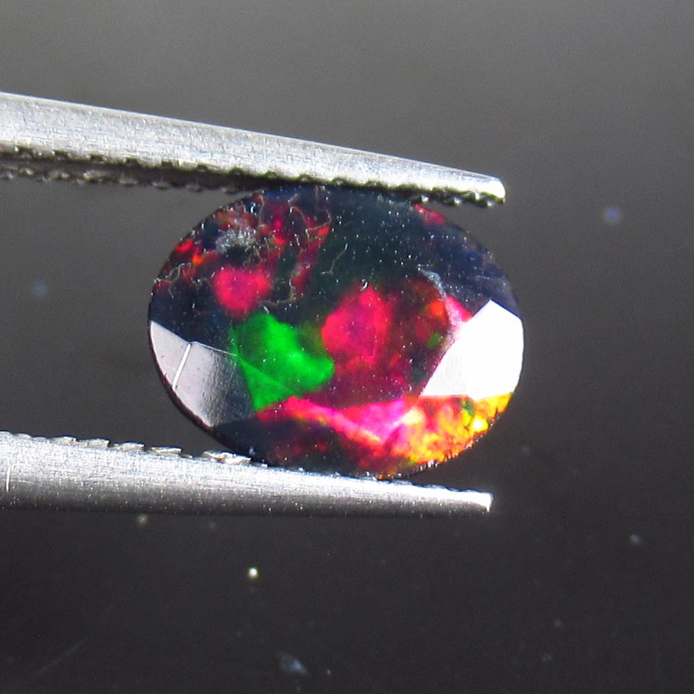 1.15 Ct Natural Ethiopian Black Fire Opal Oval Cut: No Reserve! Title: 1.15 Ct Natural Ethiopian Black Fire Opal Oval Cut Stone Clarity: Translucent Gemstone: Natural Black Opal Carat Weight: 1.15 Size/Dimensions: 9.30 x 7.50 x 4.10 mm Additional Infor