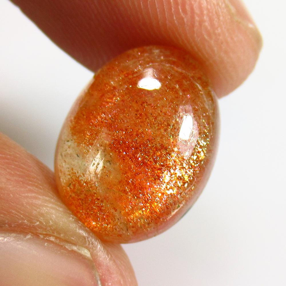 5.88 Ct Natural Orange Sunstone Oval Cab: No Reserve! Title: 5.88 Ct Natural Orange Sunstone Oval Cab Stone Clarity: Opaque Gemstone: Natural Sunstone Carat Weight: 5.88 Size/Dimensions: 13.70 x 10.40 x 5.60 mm Additional Information: Excelle