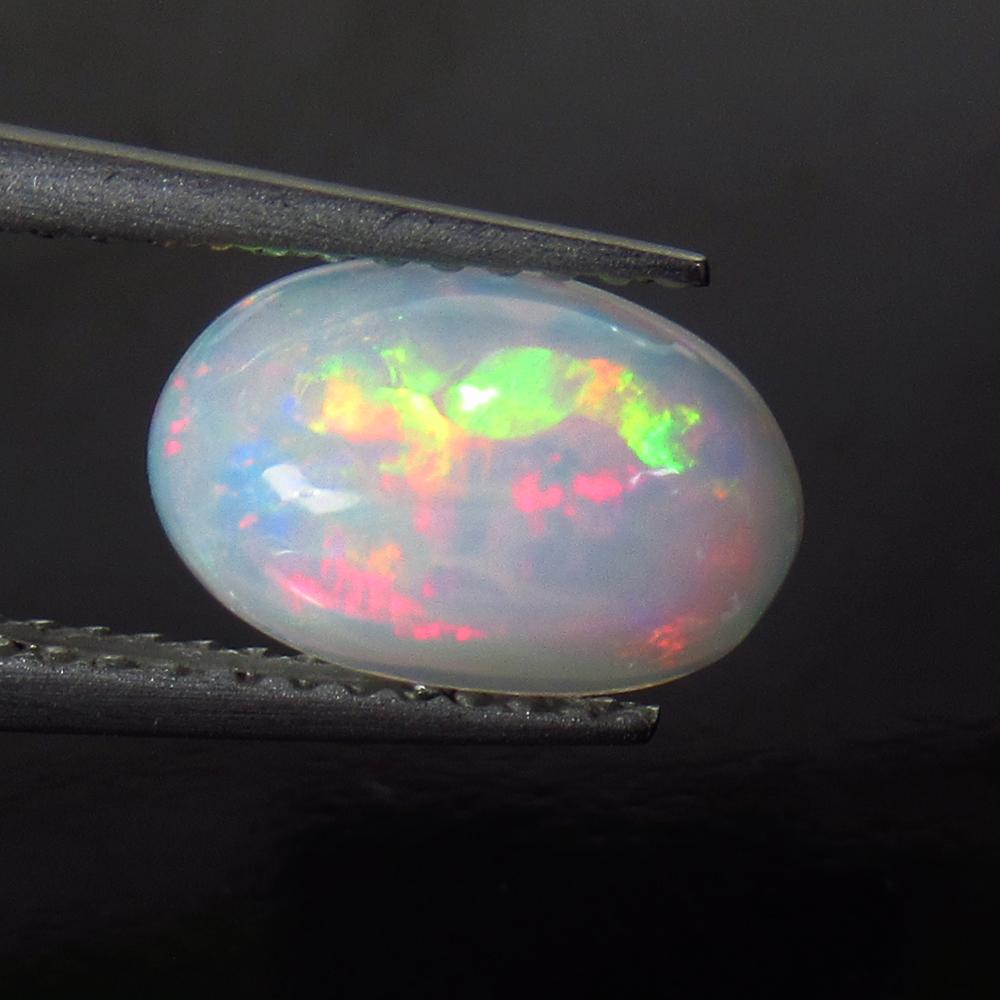 1.47 Ct Natural Ethiopian Multicolor Opal Oval Cab (1 of 2)