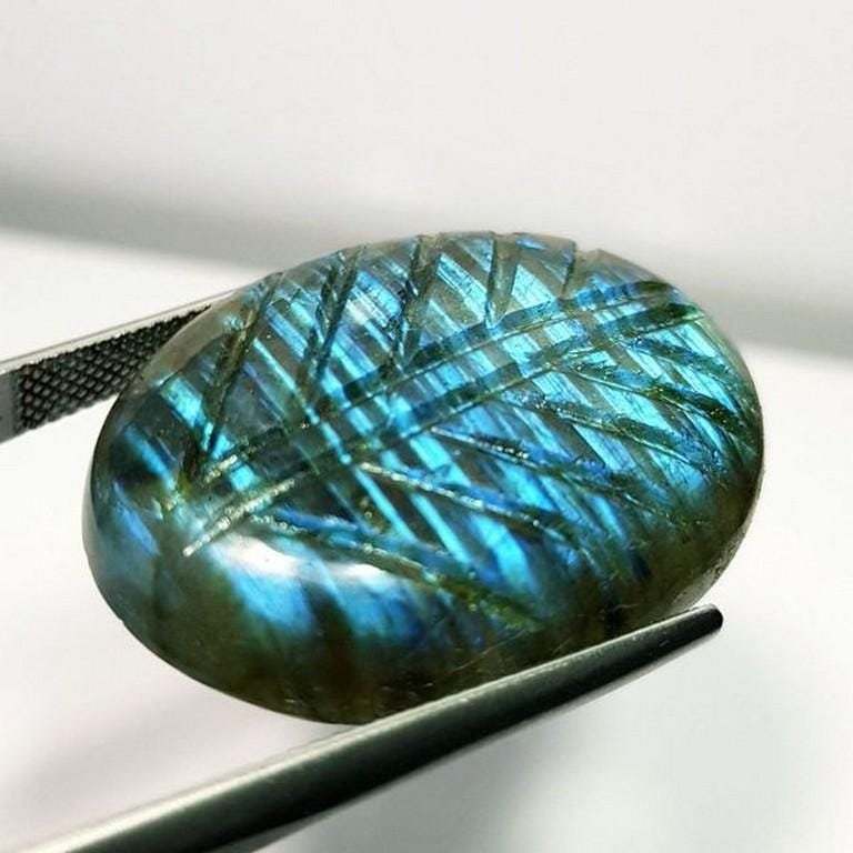 Natural Labradorite Oval Flower Cabochon 50.38 Ct: No Reserve! Title: Natural Labradorite Oval Flower Cabochon 50.38 Ct Color/Clarity: Opaque Gemstones: Loosegemstone Carat Weights: 50.38 Size/Dimensions: 32.40 x 23.80 x 7.80 Additional Information: O