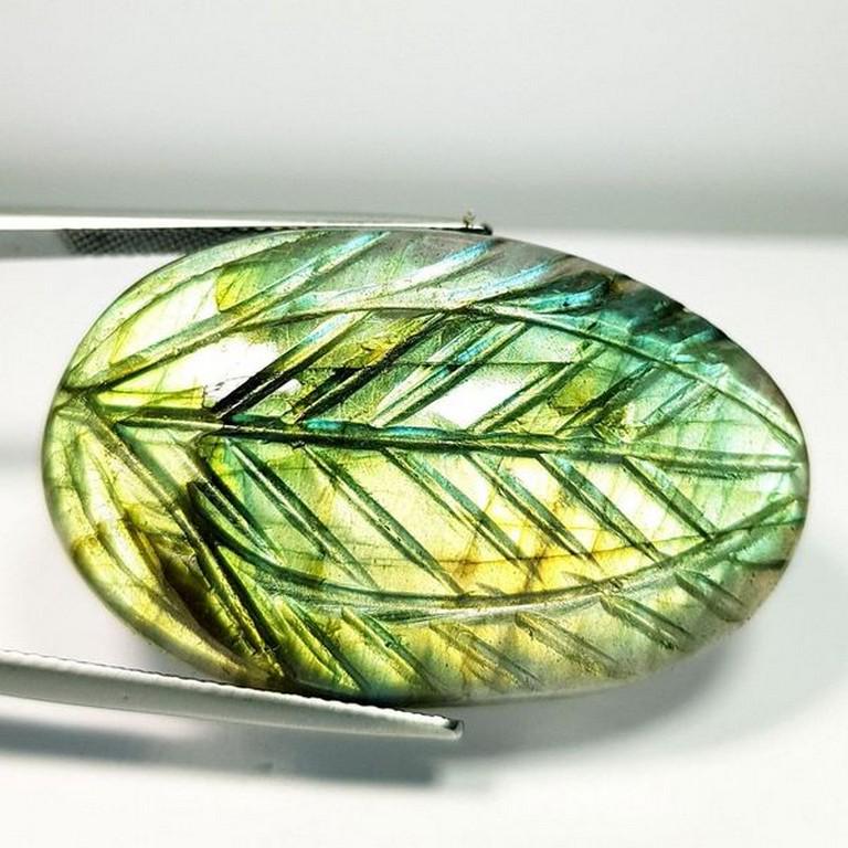 Natural Labradorite Oval Flower Cabochon 48.88 Ct: No Reserve! Title: Natural Labradorite Oval Flower Cabochon 48.88 Ct Color/Clarity: Opaque Gemstones: Loosegemstone Carat Weights: 48.88 Size/Dimensions: 36.90 x 22.95 x 6.95 Additional Information: O