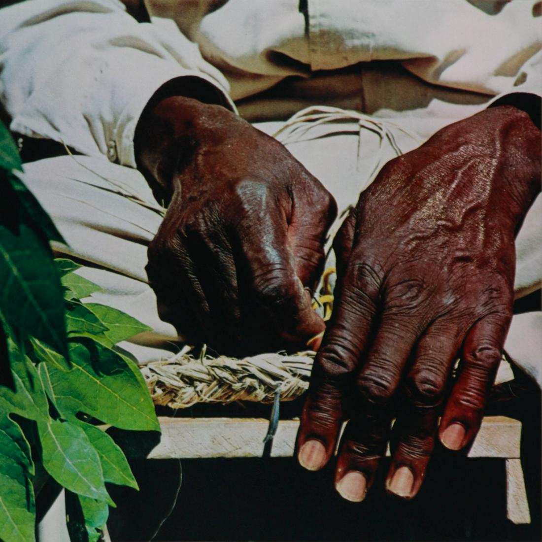 FRITZ HENLE - Hands of Moses, Weaver of Rugs: Artist: FRITZ HENLE Print Title: Hands of Moses, Weaver of Rugs Medium: Tipped in Color Gravure Printed in Switzerland in 1971 Sheet Size: 12" x 12" Image Size: 10" X 10" Fritz Henle was a German-born