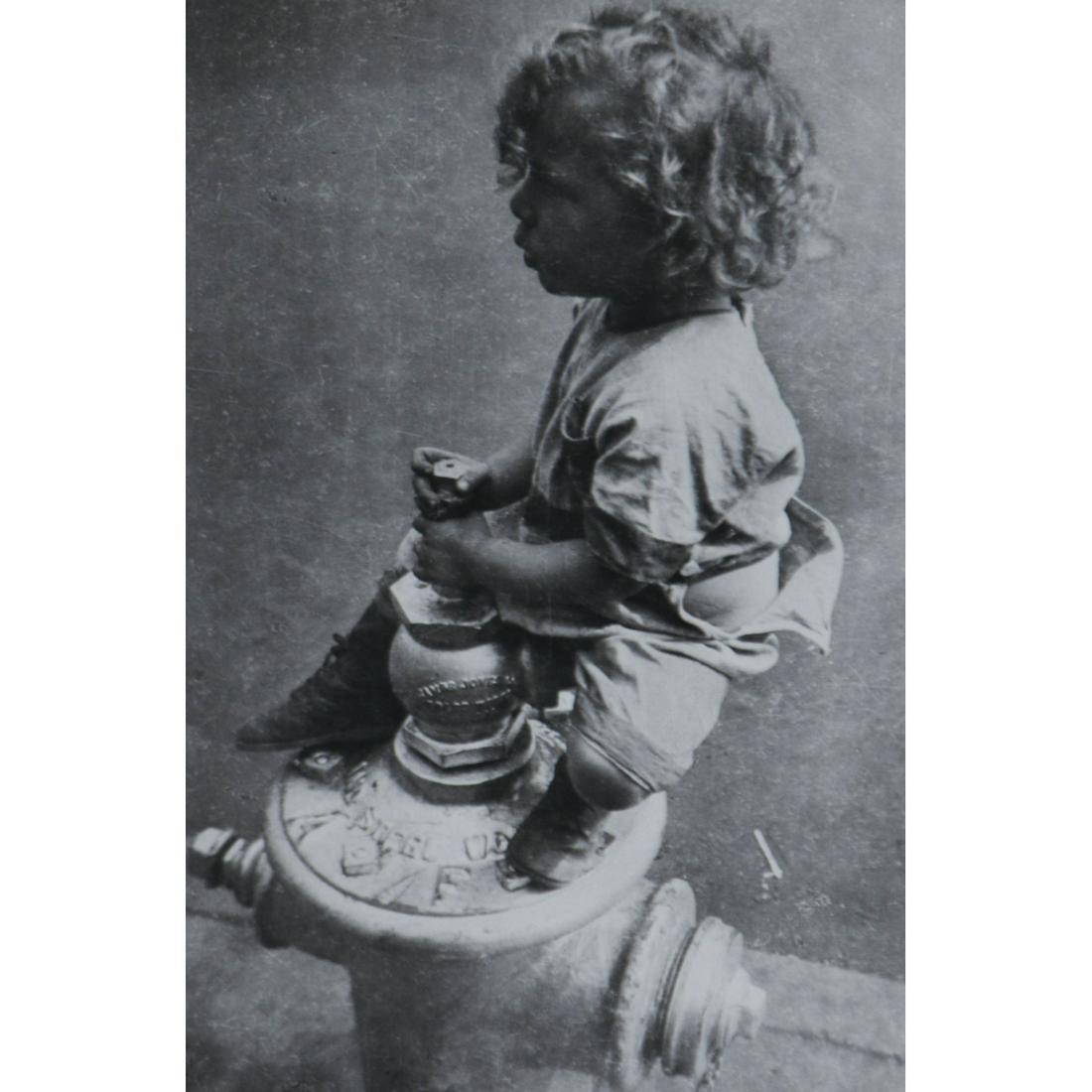 RUTH ORKIN - Boy on a Hydrant: Artist: RUTH ORKIN Print Title: Boy on a Hydrant Medium: Sheet-fed Gravure Printing Date: 1980's Printed in USA Image Size approx.: 9 x 6 inches Ruth Orkin (1921-1985) was an American photographer, ph