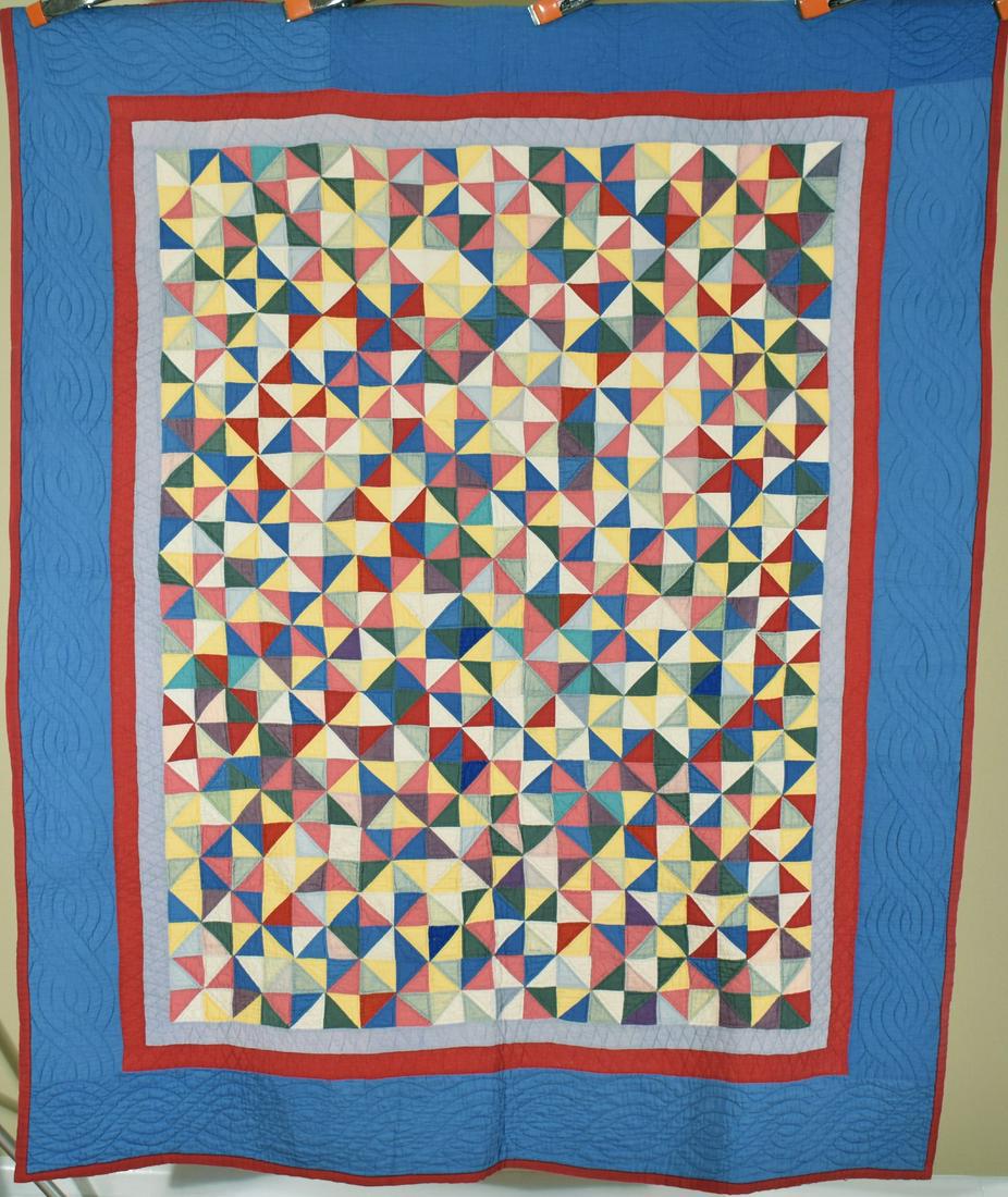 Graphic 20's Amish Broken Dishes Quilt: Cotton 20's multi color Amish broken dishes quilt, treadle machine pieced and hand quilted, with three solid borders. It measures 62" X 76" and is in very good condition, with a couple of small, faint