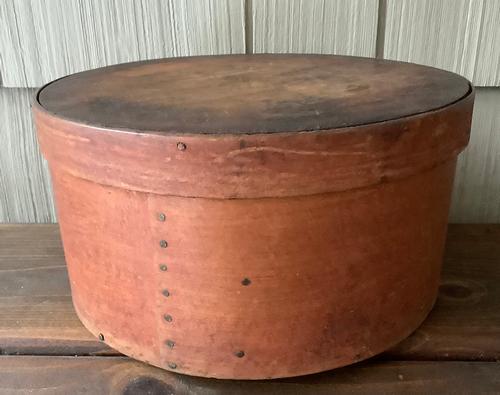 Pantry Box: Title: Pantry Box Provenance/Additional Info: 19th Century Pantry Box in a Red Wash Finish. Good Age-Related Condition. Size: 10” Dia. x 5” Tall Shipping: Domestic: Flat-rate of $25.00 to an