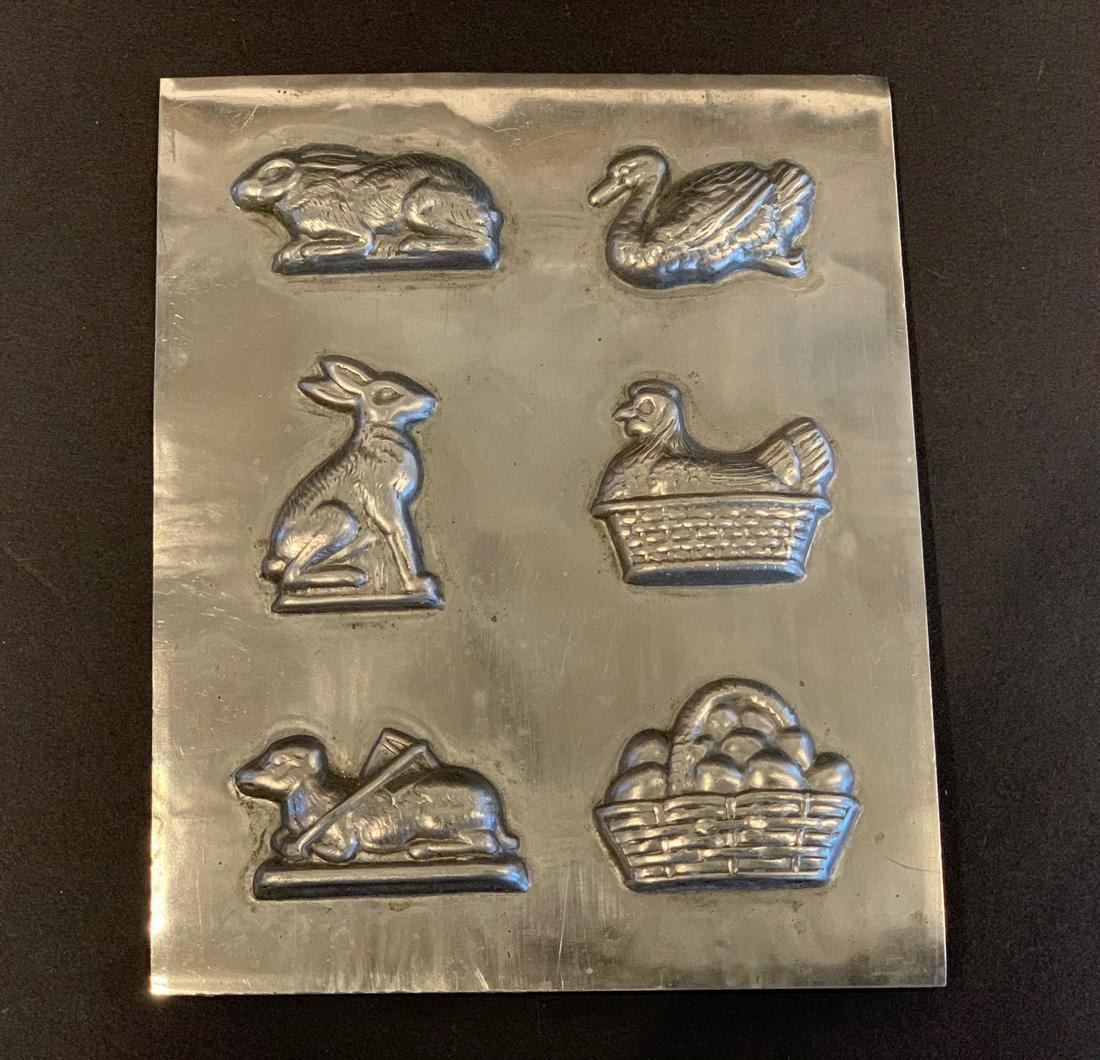 Flattie’ Miscellany Chocolate Mold, early 20th c: Title: Flattie’ Miscellany Chocolate Mold, early 20th c Description: Superbly detailed from Rabbits, a Hen, a Basket of Fruit. Dimension: 4 1/4" x 5 1/2" Circa: Early 20th c Shipping: Domestic: Flat