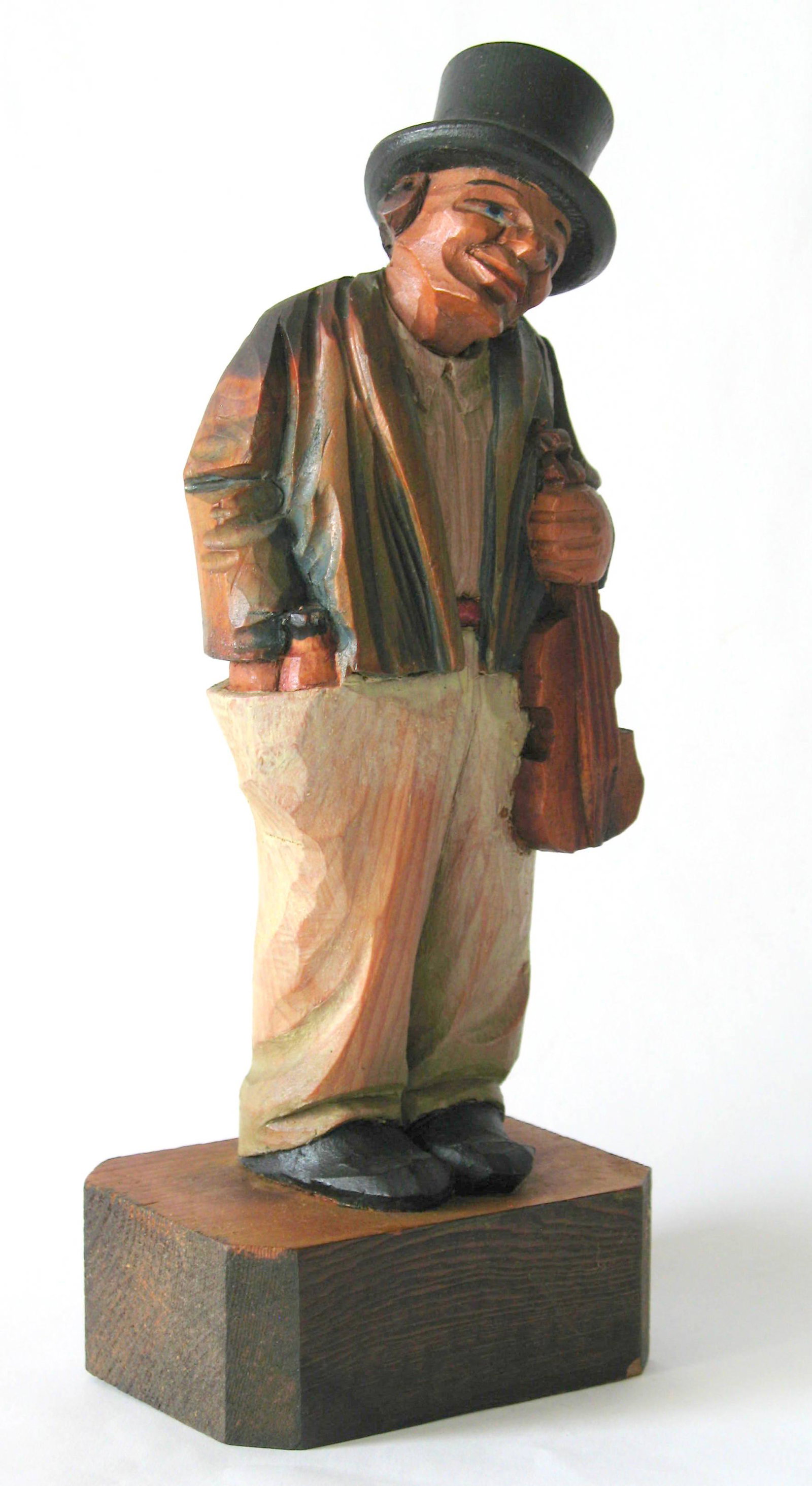 Vintage wood carving of a fiddle player.: Title: Vintage wood carving of a fiddle player. Description: Nice vintage folk art wood carving of a fiddle player, lots of attention to details. Dimension: 7 1/2” tall Circa: 1930's Shipping: Do