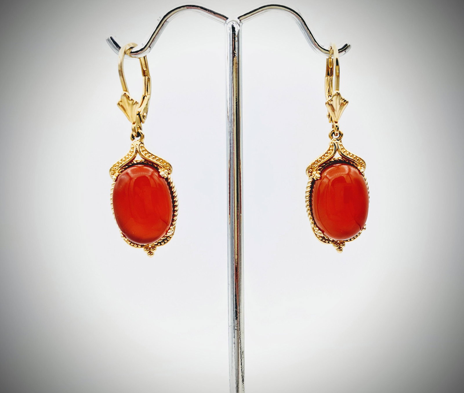 Carnelian Earrings: Title: Carnelian Earrings Brand: Jean Lin Collection Metal Purity: Gold Plated 925 Sterling Silver Gemstones: Carnelian Carat Weights: Each Earring has 1 Oval Carnelian at 13.7×10mm. Size/Dimensions: