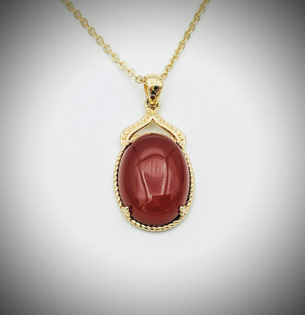 Necklace w Carnelian Pendant: Title: Necklace w Carnelian Pendant Brand: Jean Lin Collection Metal Purity: Gold Plated 925 Sterling Silver Gemstones: Gold Plated Necklace w Carnelian Pendant Carat Weights: Pendant has 1 Oval Carne