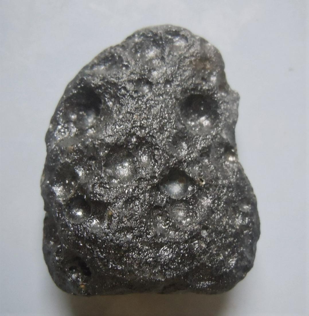 PHILIPPINITE TEKTITE - FROM METEORITE IMPACT: Title: PHILIPPINITE TEKTITE - FROM METEORITE IMPACT Origin: Paracale, Camarines Norte, Luzon, Philippines Size: 3x2x1 cm / 10 gram Description: excellent ornamental and glossy rizalite/philippinite te