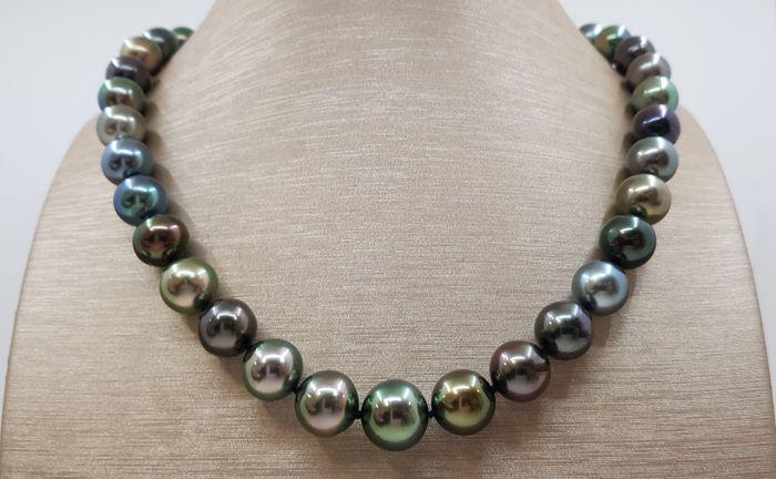 10x13mm Bright Round Multi Tahitian Pearls - Necklace: Description: A stunning multi-coloured necklace of near round Tahitian pearls, selected for their shimmering green, aubergine, purple and blue overtones, and finished with a solid invisible clasp. The