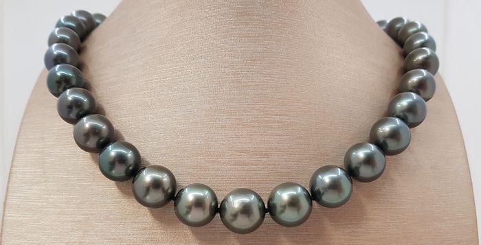 Large 11.3x13.6mm Lustrous Round Tahitian pearls -: Description: A luxury pearl necklace, made with round Tahitian pearls, and completed with a secure invisible clasp. Tahitian pearls are cultured in the warm ocean waters of the eastern South Pacific, 