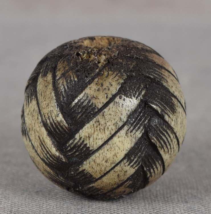 19c staghorn OJIME netsuke slide bamboo skin strips: 19th century staghorn ojime (slide bead for tightening the cord going from netsuke to inro) carved as a ball woven out of bamboo skin strips. Clever design, nice work, nice feel of age, pleasant patin