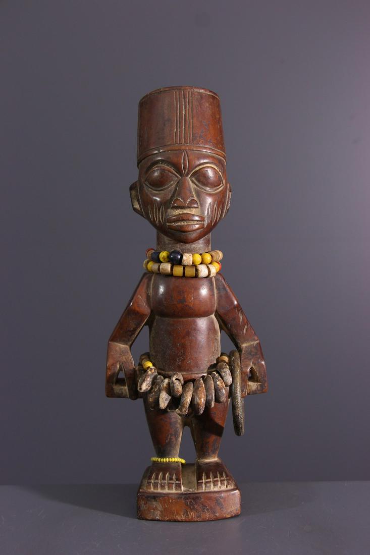 Ere Ibeji Yoruba wood figure - Nigeria - African Art: Title: Ere Ibeji Yoruba wood figure - Nigeria - African Art Tribal Art Description: Sculpted according to the indications of the Ifa transmitted to the soothsayer, the babalawo, the Ibedji statuettes 