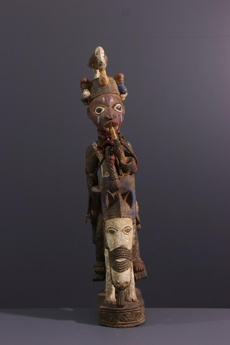 Yoruba rider wood figure - Nigeria - African Art Tribal: Title: Yoruba rider wood figure - Nigeria - African Art Tribal Art Description: It is in a sculpted statuette intended to appear on a Yoruba altar that a divinized ancestor, or one of the many gods, o