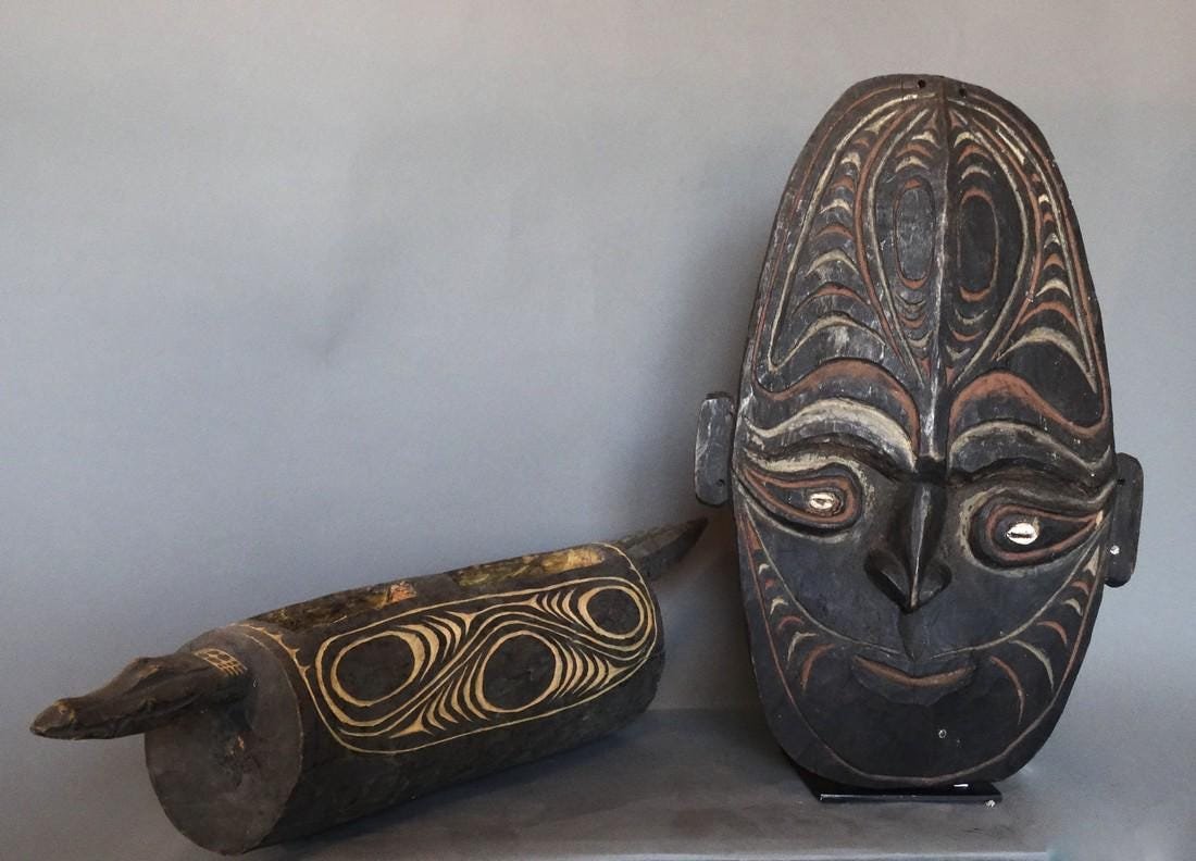 Ancestor wall mask and hand drum: No Reserve! Title: Ancestor wall mask and hand drum Description: Ancestor wall mask and hand drum from Sepik river village with surrealistic patrons. Carved out of wood this mask has the distinctive f