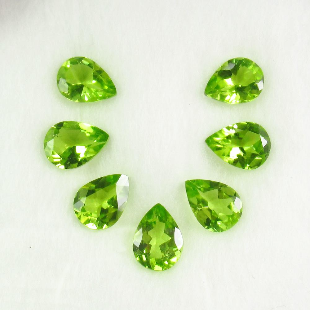 8.44 Ctw Natural 7 Pakistan Peridot Pear Necklace Set: Title: 8.44 Ctw Natural 7 Pakistan Peridot Pear Necklace Set Stone Clarity: VVS Gemstones: Peridot Size/Dimensions: 8.44 Carat Weights: 8.8x6.0 - 9.0x6.0 mm / 7 PC's Additional Information: Top Class 
