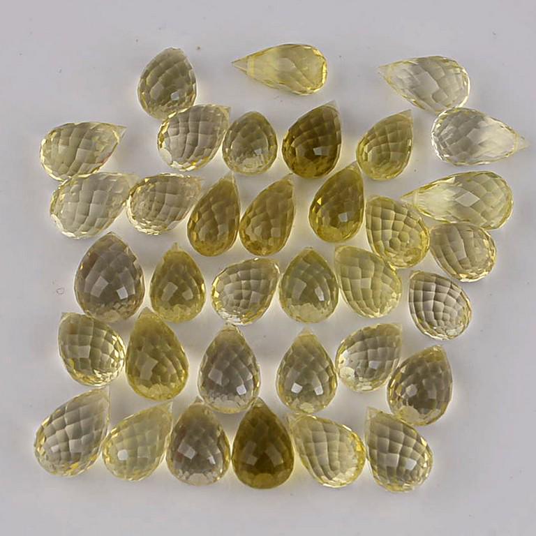 65.65 Carat Yellow Color Natural Drops Lemon Quartz: Title: 65.65 Carat Yellow Color Natural Drops Lemon Quartz Loose Gemstone 35 Pieces Brand: Gems Trading Center Gemstones: Lemon Quartz Carat Weights: 65.65 Size/Dimensions: May Vary Reserve: $43.00 Sh