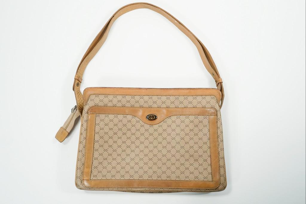 Gucci Shoulder Bag (New Inside): Title: Gucci Shoulder Bag (New Inside) Brand: Gucci Date/Period: N/A Materials: Canvas Measurement: L 11.8 W 2 H 8.5 Additional Information: Gucci micro gg shoulder bag. The inside has been replaced d