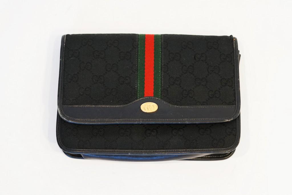 Gucci GG canvas Black pouch: Title: Gucci GG canvas Black pouch Brand: Gucci Date/Period: 1980s Materials: Leather, canvas Measurement: L 8.8 W 2 H6.2 Additional Information: Vintage Gucci black Pouch/Shoudler bag. Missing a stra