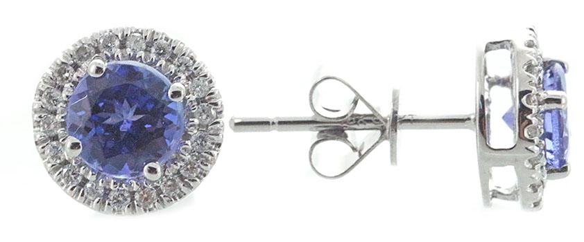 18K WHITE GOLD TANZANITE & DIAMOND EARRING: Title: 18K WHITE GOLD TANZANITE & DIAMOND EARRING Metal Purity: 18K White Gold Metal Weight: 3.86 Gemstones: Tanzanite Carat Weights: 1.27 Size/Dimensions: 5.5 Additional Information: Round Diamond Cl