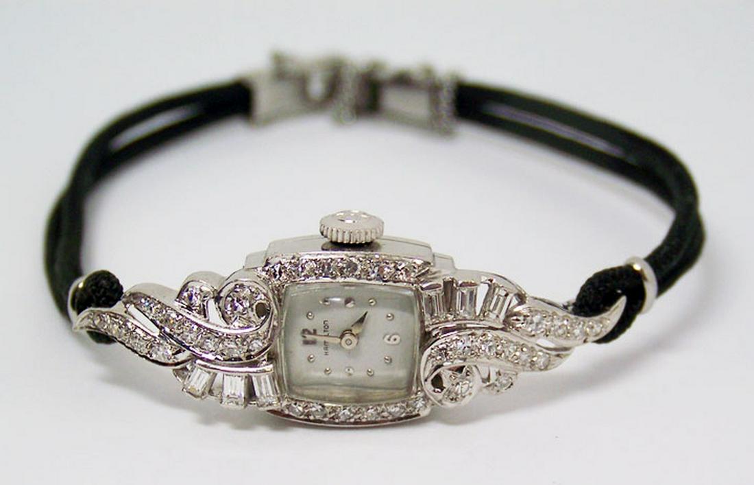 Vintage HAMILTON 1950's Platinum Ladies Watch: Description Vintage HAMILTON 1950's Platinum Ladies Watch w/Diamonds* EXLNT* SERVICED Great present for vintage watch collectors & enthusiasts! * Hamilton Series Ladies watch Collection with Diamonds 