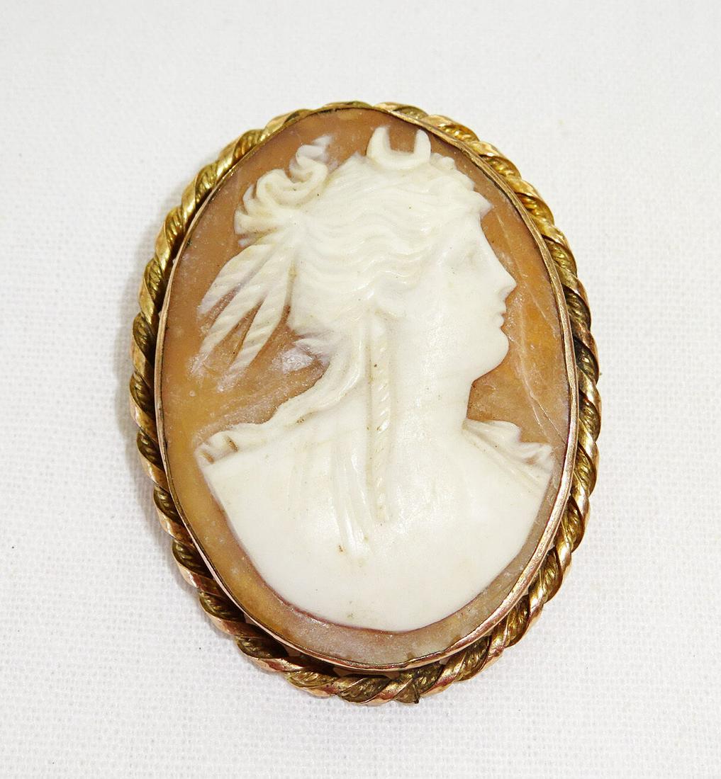 Gold Color Shell Cameo w Pretty Maidens Profile Motif: Up for sale from a recent estate in Honolulu Hawaii this Vintage Roman style twisted robe design gold colored oval shell cameo with a pretty maiden motif. The condition is described above - for more d