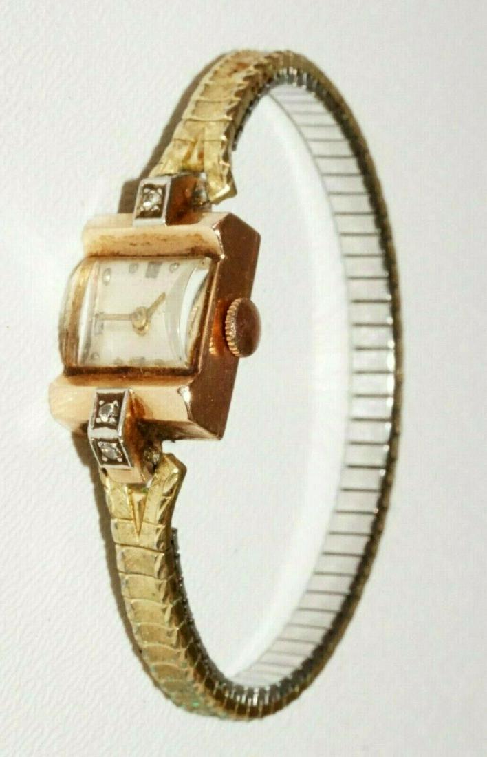 14k Gold&4x Diamonds Ladies Wristwatch 334F by Concord: Up for sale from a recent estate in Honolulu Hawaii, this Vintage Swiss 14k rose gold case and back ladies wristwatch whose Dial is set with Marcasite and which is further accented with 4x melee sized