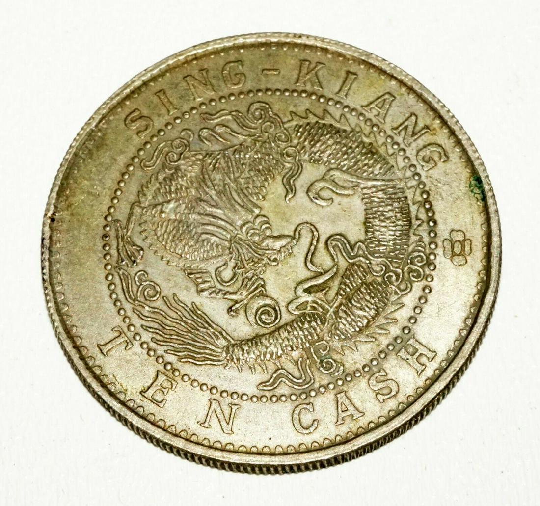 Chinese Brass Coin Ten Cash Sing Kiang Xinjiang Provinc: Up for sale from a recent estate in Honolulu Hawaii, this 1903-1906 Chinese white brass ten cash coin from Sing Kiang or Xinjiang Province. The condition is described above for more information please