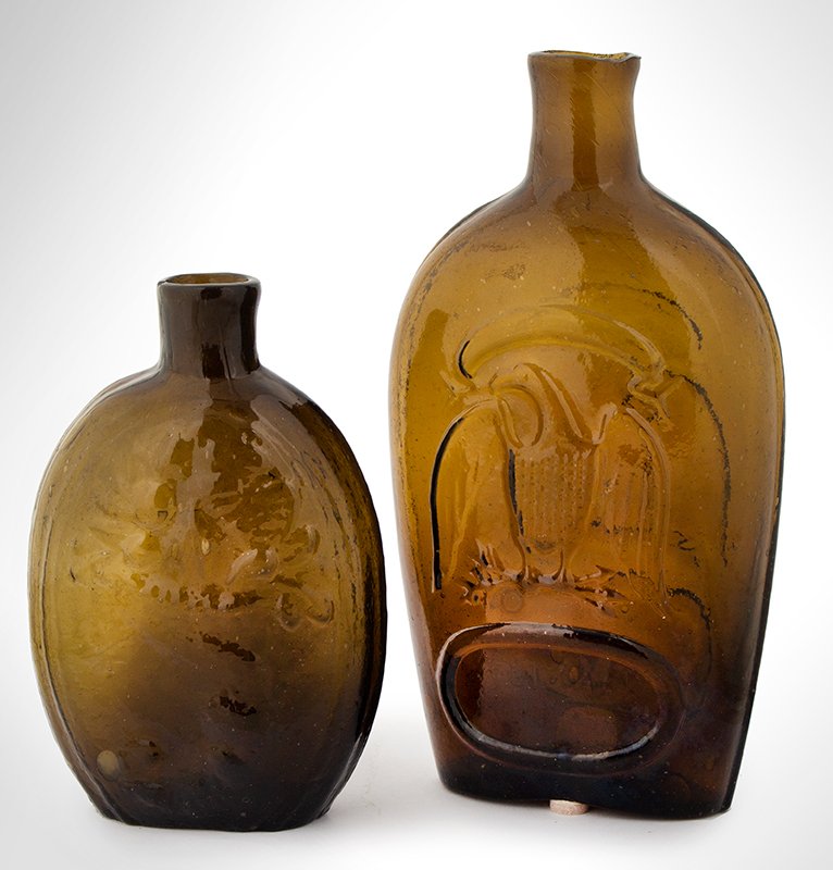Two Flask Lot: SKU: 1224-5,6- offered as a lot Title: Double Eagle, Historical Pint Flask, GII-82 Date/Period: 1846-1860 Measurement: Material: glass Condition: very good Additional Information: Stoddard, New Hampsh