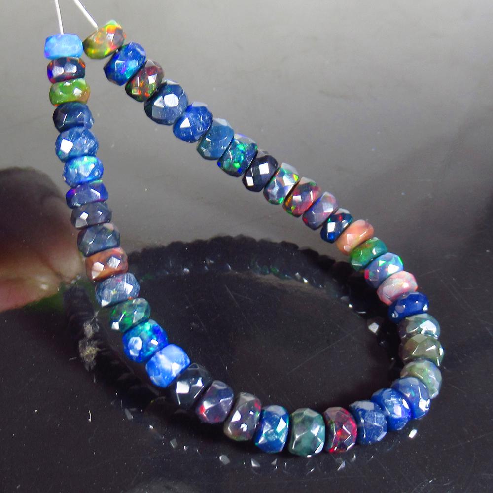 11.65 Ctw Natural 43 Drilled Faceted Black Opal Beads: Title: 11.65 Ctw Natural 43 Drilled Faceted Black Opal Beads Stone Clarity: Translucent Gemstones: Faceted Black Opal Beads Size/Dimensions: 11.65 Carat Weights: 3.80 to 5.00 mm / 43 PC's Additional I