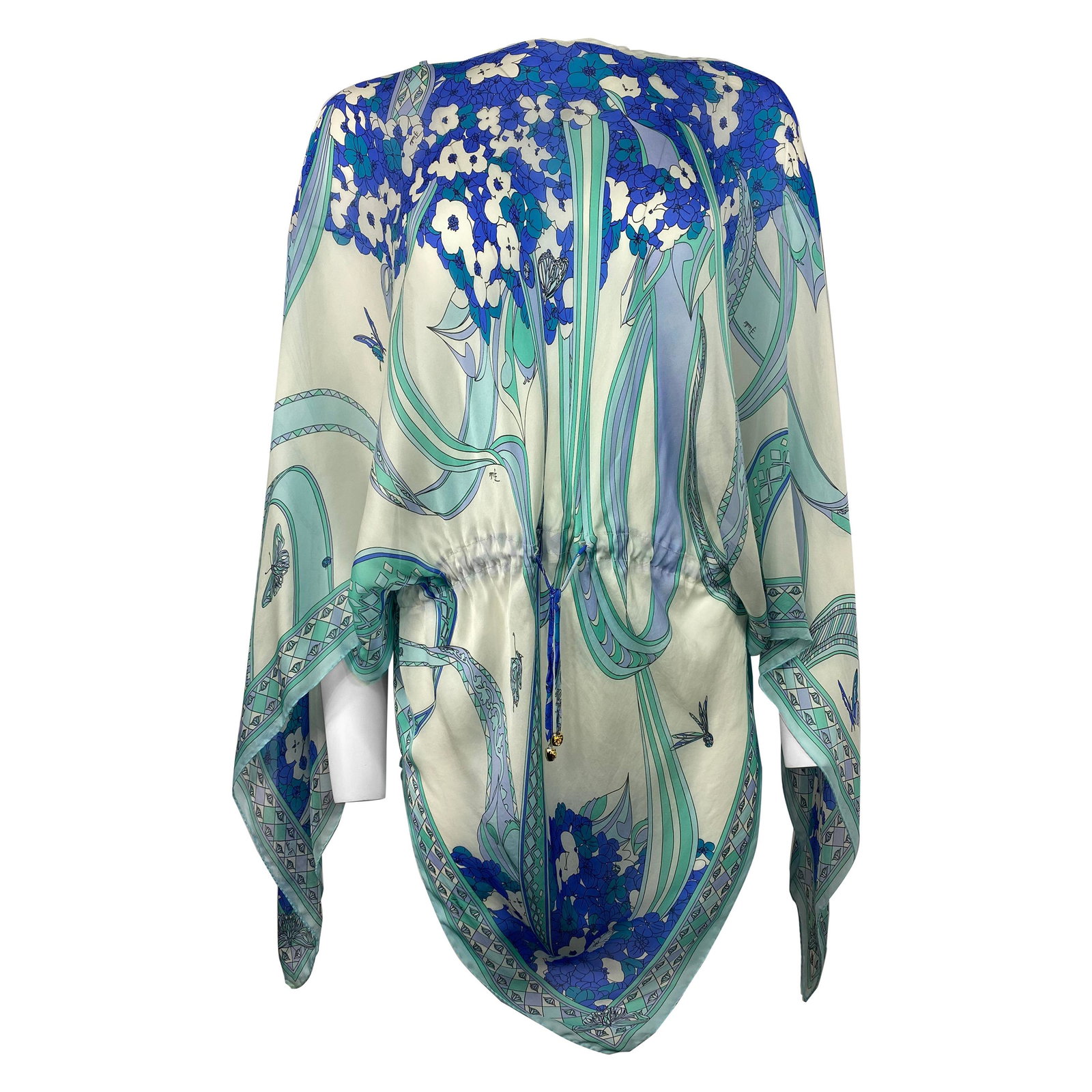 Emilio Pucci White and Blue Silk Tunic Cover Up One: Product details: Featuring silk, white, blue and turquoise, floral pattern print, adjustable tie lace at the waist, loose fit. Could be styled as cover up at the beach or by the pool side or it could 