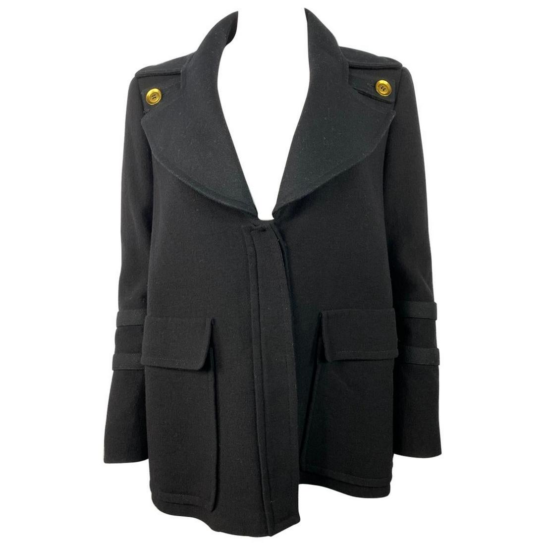 Vintage Givenchy Black Wool Outwear Jacket Size 40: Product details: Size FR 40. Featuring black wool, open chest, collar, gold tone button detail on each side, four front button closure, dual front pockets, half belt detail on the back. Made in Italy.