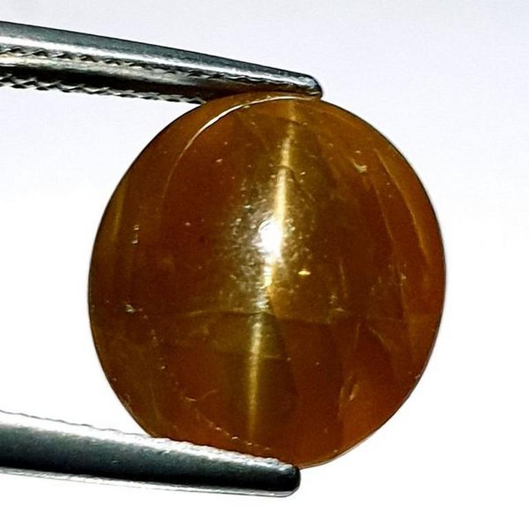 12.79 ct Natural Apatite cat's Eye: No Reserve! Title: 12.79 ct Natural Apatite cat's Eye Color/Clarity: Semi Transparent Gemstones: Loosegemstone Carat Weights: 12.79 Size/Dimensions: 14.00 x 12.70 x 8.40 Additional Information: Oval -