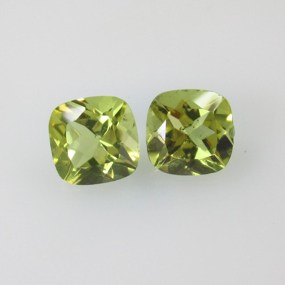 4.13 Ctw Natural Lemon Quartz Cushion Pair: No Reserve! Title: 4.13 Ctw Natural Lemon Quartz Cushion Pair Stone Clarity: VVS Gemstone:Lemon Quartz Carat Weight: 4.13 Size/Dimensions: 8.00 x 6.00 x 5.70 mm / 2 PC's Additional Information: Good L