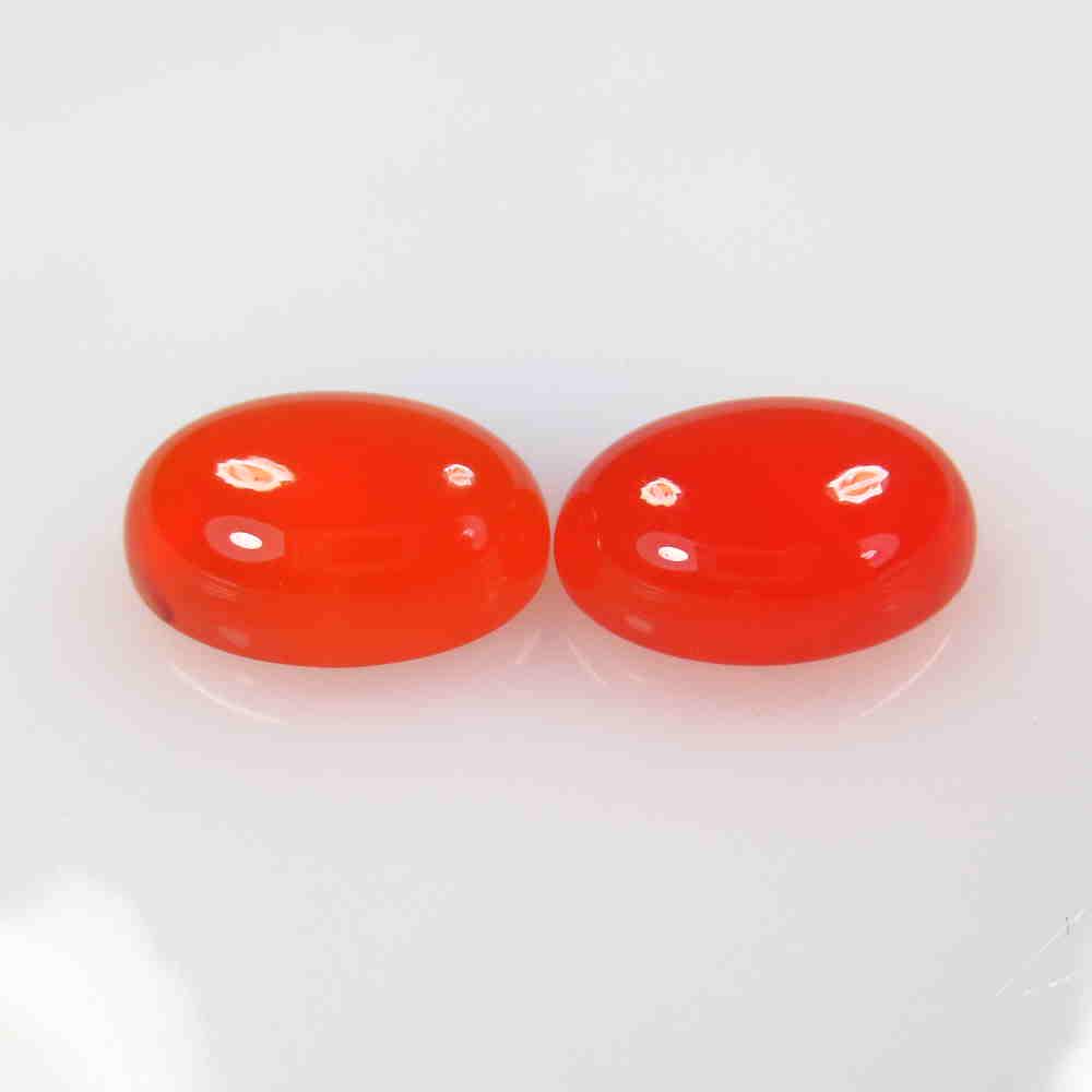 12.43 Ctw Natural Orange Carnelian Oval Pair: No Reserve! Title: 12.43 Ctw Natural Orange Carnelian Oval Pair Stone Clarity: Semi-Transparent Gemstone:Carnelian Carat Weight: 12.43 Size/Dimensions: 14.10 x 10.00 x 5.70 mm / 2 PC's Additional Info