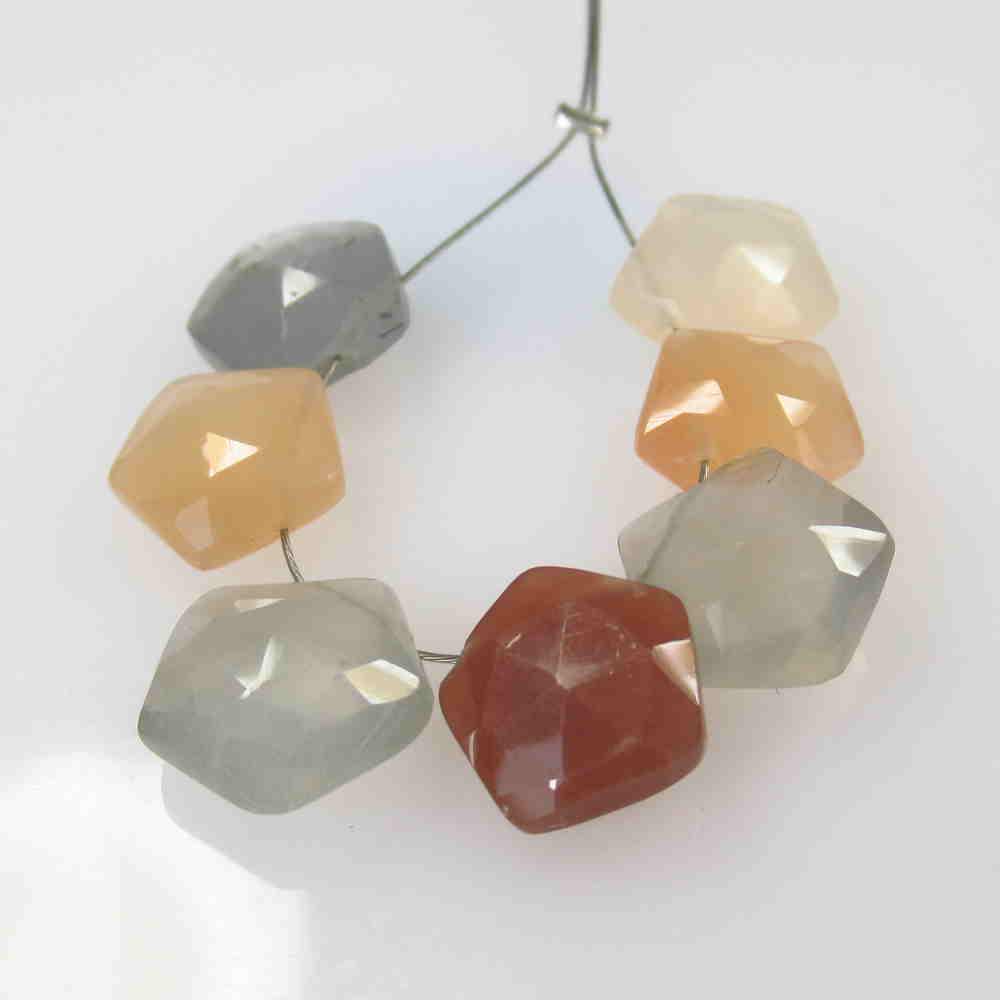 15.33 Ctw Natural 7 Moonstone Drilled Fancy Beads: No Reserve! Title: 15.33 Ctw Natural 7 Moonstone Drilled Fancy Beads Stone Clarity: Semi -Transparent Gemstone:Moonstone Beads Carat Weight: 15.33 Size/Dimensions: 8.8x8.8 - 9.6x9.6 mm / 7 PC's Additi