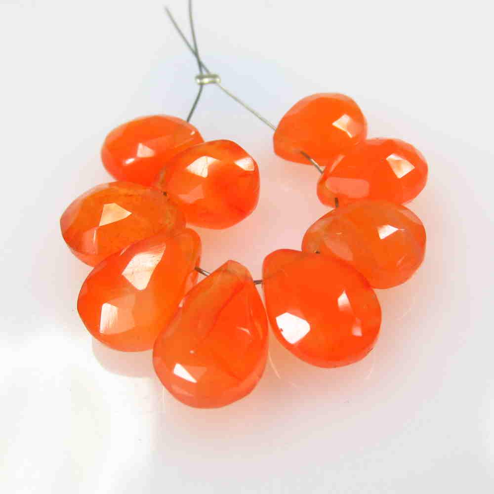 23.97 Ctw Natural 9 Carnelian Drilled Pear Beads: No Reserve! Title: 23.97 Ctw Natural 9 Carnelian Drilled Pear Beads Stone Clarity: Semi-Transparent Gemstone:Carnelian Beads Carat Weight: 23.97 Size/Dimensions: 9.1x7.9 - 11.6x7.8 mm / 9 Pc's Additio
