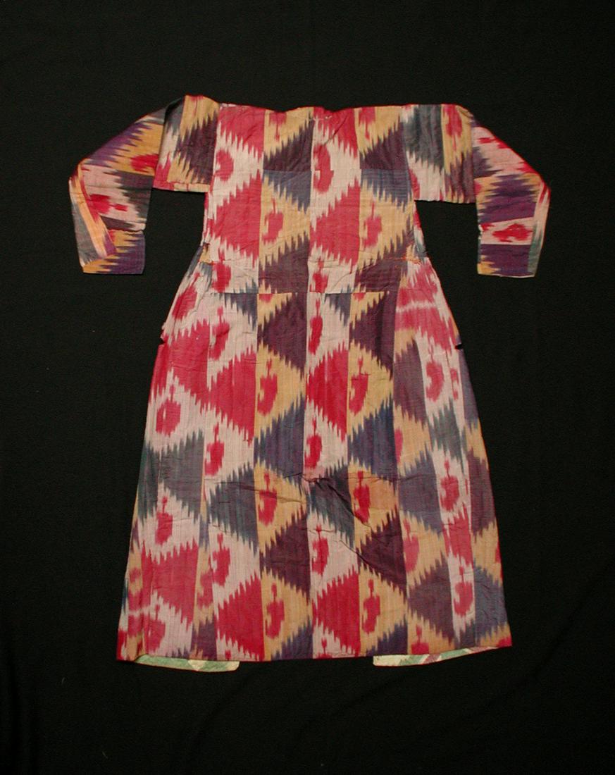 Afgan Chapan: Title: Afgan Chapan Description: Uzbek ikat-dyed silk ceremonial robe (chapan) from northern Afghanistan, quilted with cotton interlining. Condition is overall good, albeit with some minor staining. I
